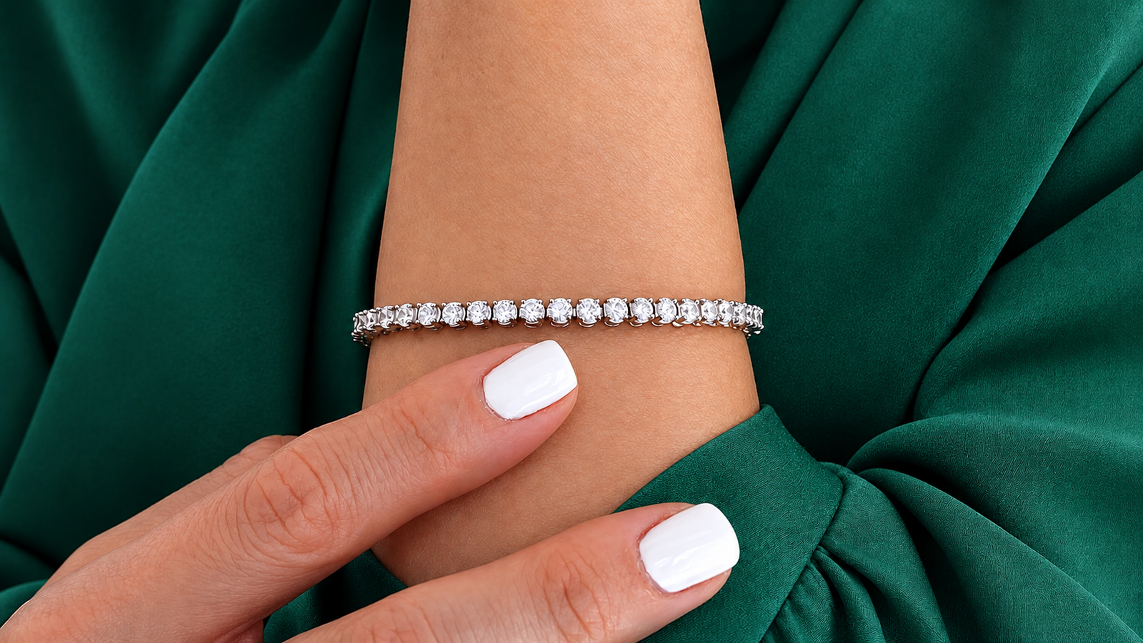 Friend showcasing a sparkling tennis bracelet, highlighting affordable luxury jewelry as a thoughtful gift for someone special.